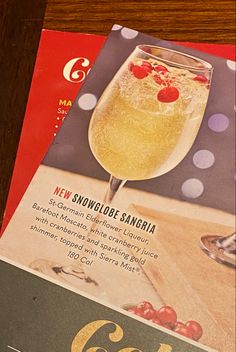 two magazines on top of each other with drinks in them