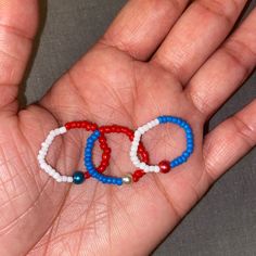 Brand New Handmade 4th Of July Glass Seed Bead Elastic Ring Set Handmade With Lots Of Love! 3 Rings. 2mm Crystal Glass Seed Beads. 4mm Glass Round Beads. High Quality Stretchy Elastic. The Elastic On These Rings Makes It Easy To Slide On/Off The Finger. Red, White & Blue. Fits Ring Sizes: 6-8. Super Cute & Trendy! Perfect For Everyday And Stacking With A Mix And Match Of Colors! Blue Rings With Colorful Beads For Gift, Seed Bead Ring, Elastic Rings, Pony Beads, Seed Bead Bracelets, Slide On, Ring Sizes, Glass Seed Beads, Beaded Rings