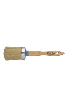 a paint brush with a wooden handle and blue bristles on the tip, against a white background