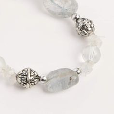 Buy the John Bead Crystal Quartz Clear Natural Stone Bracelet at Michaels. com. Crystal quartz is often associated with energy, clear thinking, psychic ability and spiritual development. The clear natural stone bracelet features various-sized beads and ornate silver-tone spacer beads. Crystal quartz's gentle but powerful energy brings balance to all subtle bodies, singularly and with one another, making it a good choice in chakra healing. It is often associated with energy, clear thinking, psych Silver Spiritual Crystal Bracelet For Healing, Silver Gemstone Crystal Bracelet For Meditation, Spiritual Clear Beaded Bracelets, Clear Gemstone Beads Jewelry For Healing, Healing Clear Gemstone Beads Jewelry, Subtle Bodies, Psychic Ability, Clear Thinking, Powerful Energy