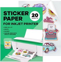 a white printer with stickers on it next to a green and white sign that says sticker paper for inkjet printers