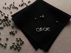 This monogrammed handkerchief you need if you are looking for personalized gift for a special occasion or a family holiday.  It mades of the 100% cotton +/-12*12 inch (30*30 cm) and personalized with a hand embroidered monogram of two initials.  Embroidery mades by hands and it takes about 1 week. Details: Material - 100% cotton, which is hold the shape well and dense enough.  Handkerchief color - black Embroidery color - white, or your color. Size - +/- 12*12 inch (30*30 cm). For order I need n Classic Handkerchiefs For Father's Day Gift, Classic Black Pocket Square Gift, Classic Personalized Handkerchiefs For Gifts, Classic Personalized Handkerchiefs As Gift, Classic Customizable Handkerchiefs For Gift, Elegant Embroidered Handkerchiefs Gift, Monogrammed Handkerchief, Initials Embroidery, Cotton Anniversary Gifts For Him