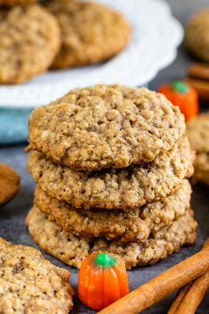 cookies stacked on top of each other with cinnamon sticks