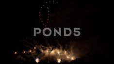 fireworks are lit up in the night sky with words pond5 on it's side