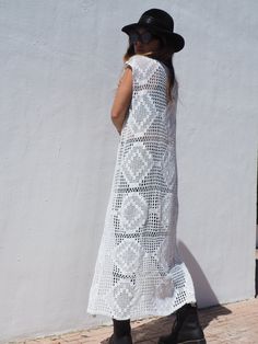 Vintage 1970’s crochet long white up-cycled waistcoat made by Vagabond Ibiza. We hand source antique and vintage crochet & lace textiles and up-cycle it here in Ibiza in to unique on off a kind garment just for you. Due to the nature there could be some imperfections but we do our best to only recycle mint condition textiles. Size is medium Condition is perfect White Sleeveless Crochet Festival Dress, White Sleeveless Crochet Dress For Festival, White Bohemian Long Crochet Dress, White Long Bohemian Crochet Dress, Vintage Sleeveless Crochet Beach Dress, Vintage Sleeveless Crochet Dress For The Beach, White Bohemian Crochet Dress, Clothing Exchange, Padded Hangers