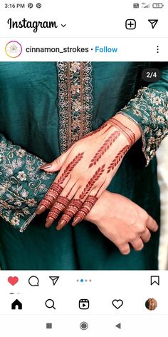 a woman's hand with henna on it, and the words instagram