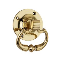 an antique brass door handle on a white background