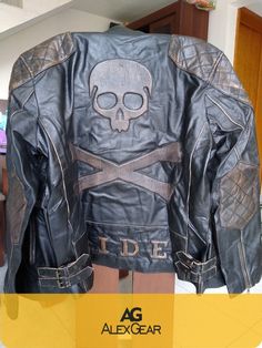 Checkout this amazing Skull Leather Jacket with embossed Skull and Crossbones. This belted leather jacket is made with real cowhide leather. With zip closure and 4 zipper pockets this jacket makes an ideal choice for motorcycle enthusiasts and bikers in leather. Buy this Mens black leather jacket now at Flat 35% discount Embroidered Skull, Black Leather Moto Jacket, Cafe Racer Jacket, Racer Jacket