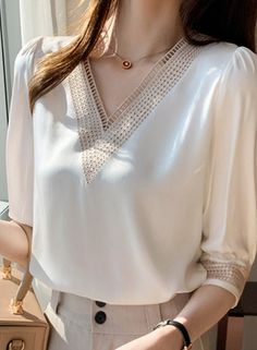 KAILA EMBROIDERED BLOUSE Embroidery V-Neck Faux silk, polyester Loose elegant fit True to size Adjastable Cufs SIZE BUST LENGTH LONG SLEEVE SHORT SLEEVE SHOULDER S cm 94 61 56 36 36 inches 37 24 22 14.2 14.2 M cm 98 62 57 37 37 inches 38.6 24.4 22.4 14.6 14.6 L cm 102 63 58 38 38 inches 40.2 24.8 22.8 15 15 XL cm 106 64 59 39 39 inches 41.7 25.2 23.2 15.4 15.4 XXL cm 110 65 60 40 40 inches 43.3 25.6 23.6 15.7 15.7 CARE INSTRUCTIONS: Don't Bleach, Don't dry clean, Don't iron, for better washing r Blouse Embroidery, Chic Shirts, Crop Top Sweatshirt, Polka Dot Shirt, Corsets And Bustiers, Lovely Tops, Elegant Blouses, Shirt Embroidery, Long Knit