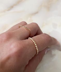 Our stacking ring is in a set of 2 rings, a Flat Top Ring and Dot Ring. You can choose the material that you like and of course, it is with a hammered style to give it a spectacular shine. Material: 14K gold-filled, 14K rose gold-filled, sterling silver Measure: approximately 1.5mm Stackable Double Band Rings As Gift, Stackable Double Band Rings For Gift, Tarnish Resistant Open Band Stackable Rings As Gift, Tarnish Resistant Double Band Rings For Gift, Gift Double Band Tarnish Resistant Rings, Gift Tarnish Resistant Double Band Rings, Fine Jewelry Midi Rings With Double Band As Gift, Fine Jewelry Double Band Midi Rings As Gift, Dainty Open Band Metal Ring Jewelry