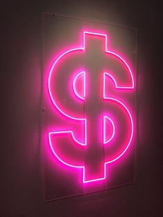 a neon sign that is on the wall