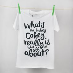 "A bold and carefree typography t-shirt made from 100% organic cotton. This quote t-shirt is an uplifting twist on the nursery rhyme the Hokey Cokey This high quality, organic t-shirt with its unique and playful design is a cheerful reminder to enjoy life and make time to create happy memories... That's what it's all about! After the popularity of our Hokey Cokey Typography Print (featured in \"The Simple Things Magazine\" autumn 2014) we were inspired to create a wearable version. Spreading the Funny Cotton T-shirt With Lettering, Garment Workers, Typography T Shirt, Slogan Tshirt, Personalized Graduation Gifts, Nursery Rhyme, Typography Tshirt, Organic Clothing, Fun Loving