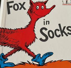 a book with an image of a fox in socks