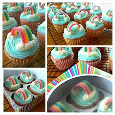 cupcakes with icing and rainbow decorations on them