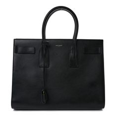 This is an authentic SAINT LAURENT Calfskin Large Sac de Jour Carryall in Black. This tote is crafted of calfskin leather in black. The bag features sturdy rolled leather top handles, exterior straps on both the front and back that unsnap to release the accordion style, and gold hardware. The top opens to a black suede interior with a zipper compartment, zipper and patch pockets. Leather Top, Black Suede, Gold Hardware, Patch Pocket, Calf Skin, Saint Laurent, Handles, Exterior, Tote Bag