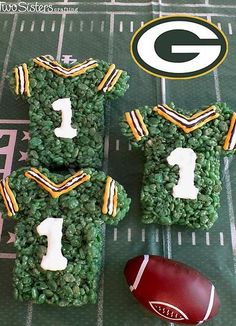 green bay packers rice krispie treats on a football field with the number one and two