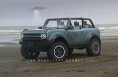 an suv is parked on the beach by the ocean with a flying object in the background