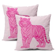 two pink tiger pillows sitting next to each other