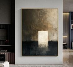 a painting hanging on the wall in a living room