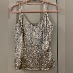 Scala Gold Sleeveless Sequined Top Size Small Stretch Sleeveless Tank Top For Party, Stretch Sequined Tank Top, Sequined Sleeveless Camisole For Parties, Sleeveless Sequined Camisole For Party, Party Sequin Sleeveless Camisole, Spring Sleeveless Camisole For Night Out, Party Stretch Tank Camisole, Stretch Cami Vest For Parties, Stretch Cami Tank Top For Party