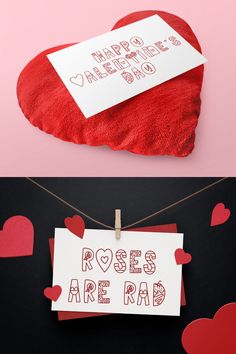 two valentine's day cards hanging from clothes pins on a string with hearts around them