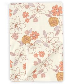 an orange and white floral print sheet set