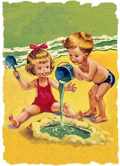 two children playing in the sand at the beach