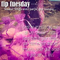 a bottle of wine sitting on top of a pile of pink tulips with the words tip tuesday next to it