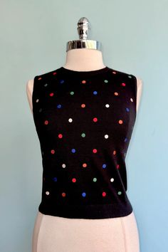 Rainbow Dot Embroidered Black Sweater Vest by Tulip B. – Modern Millie Fitted Black Sweater Vest, Black Fitted Sleeveless Sweater, Fitted Black Sleeveless Sweater, Fitted Sleeveless Black Sweater, Retro Fitted Sleeveless Sweater, Fitted Crew Neck Sweater Vest, Black Sweater Vest, Modern Millie, Knit Sweater Vest