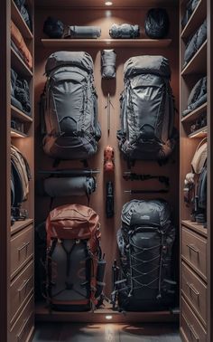 An elegant closet with a sophisticated backpacking gear wall and neatly arranged outdoor gear. Elegant Closet, Camping Gear Checklist, Tactical Wall, Gear Room, Tactical Pouches, Tool Storage Diy, Backpack Organization