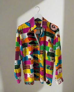 1990's Louis Feraud pop art button down shirt. Andy Warhol inspired, this collection is a favorite for vintage collectors. If you know, you know. Size US 8- fits like a Medium Shoulder 18" Chest 21" Length 28.5" 100% Polyester Multicolor Abstract Print Button-up Shirt, Retro Shirt With Vibrant Spring Print, Multicolor Collared Shirt With Vibrant Print, Colorful Printed Retro Tops, Multicolor Collared Top With Retro Print, Fun Multicolor Long Sleeve Shirt, Bold Graphic Print Long Sleeve Tops, Fun Multicolor Printed Shirt, Trendy Multicolor Shirt With Abstract Print