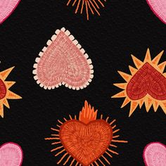 an image of hearts and sunbursts on a black background with pink accents