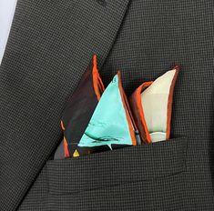 "\"Altar II in Teal ,\" a 3D Fractal design with fascinating detail and structure. Rendered in 3D and digitally printed on fine silk. Bright color in art-to-wear on very high quality silk satin pocket square with a hand-rolled hem.   Add on an optional polyethylene Pocket Square Holder to help with keeping your fancy fold in place! It will be shipped with your pocket square. Keep your look crisp at weddings or events even if you aren't a frequent pocket-square wearer. * Digitally printed original design * 100% silk satin * Approx. 16\" square  * Hand-rolled hem * Dry clean only * Ironing OK. Use of press cloth recommended. * Arrives packed in an elegant gift-box" Luxury Silk Pocket Square For Gift, 3d Fractal, Small Silk Scarf, Silk Handkerchief, Fractal Design, Silk Pocket Square, Unique Gifts For Men, Fancy Folds, Pocket Squares