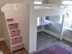 there is a loft bed with stairs in the room