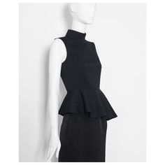 Stunning vintage 2008 runway black silk asymmetric peplum SAINT LAURENT sleeveless top by Stefano Pilati  featuring a fitted tailored bodice with 3 loop & button closure at the neck, slanted peplum, zips at the side. truly masterfully constructed piece The beautiful black 100% raw silk fabric is partially lined label says: YVES SAINT LAURENT A/W 2008 Made in France - Size FR 36 Measurements are taken flat: shoulder: 36 cm Bust: 42 cm Waist: 34 cm  Hip: free Length: 85 cm Perfect hardly worn vint Chic Fitted Peplum Top, Fitted Chic Peplum Top For Night Out, Chic Fitted Peplum Top For Night Out, Summer Evening Fitted Peplum Top, Elegant Summer Peplum Top, Fitted Black Peplum Top, Spring Evening Peplum Top, Elegant Ruffled Peplum Top For Work, Fitted Evening Peplum Top