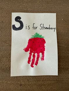 a handprint with the letter s is for strawberry