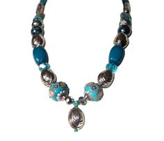 1 of Kind Blue Chunky Necklace, Blue Silver Chunky Necklace, Silver Ornate Turquoise Necklace,Ornate Turquoise Necklace,Blue Silver Necklace This is a nice 1 of kind fun chunky dark muted turquoise blue and silver ornate necklace which would be a great standout statement piece for your wardrobe. What do you have in your wardrobe that would look better with this necklace?  measurement: 23" length 11" hanging length There are many styles of jewelry. I personally like my jewelry colors to match my Turquoise Colorful Beads Costume Jewelry Necklace, Elegant Large Beads Turquoise Necklace, Turquoise Costume Jewelry Necklaces With Colorful Beads, Turquoise Costume Jewelry Necklace With Colorful Beads, Elegant Turquoise Necklace With Large Blue Beads, Elegant Blue Turquoise Necklace With Large Beads, Blue Turquoise Necklace With Large Beads For Jewelry Making, Beaded Blue Turquoise Costume Necklace, Beaded Blue Turquoise Costume Jewelry Necklace