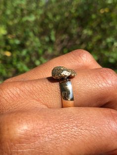 Natural Gold Nugget on a 14k yellow gold band. The nugget came from a pair of antique cufflinks, probably California or Alaskan gold. The nugget is likely 22-24k gold. The band is a vintage gold band, nice and wide. Marked Orange Blossom, 14KT. Size 8. Weighs 5.4 grams. Heirloom Nugget Rings As Gift, Unique 14k Stamped Gold Jewelry, Unique Untreated Yellow Gold Jewelry, Unique Untreated 14k Gold Jewelry, Recycled Gold Untreated Jewelry As A Gift, Untreated Recycled Gold Jewelry As A Gift, Untreated Recycled Gold Jewelry Gift, Untreated Heirloom 14k Gold Jewelry, Hammered Gold Signet Ring In 14k