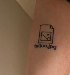 a tattoo that says tattoo jpg on the side of a person's leg