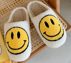 The Smiley trend is here to stay! Get cozy in the best selling smiley face slippers Specifications; Small Fits sizes 5-6 Medium Fits sizes 7-8 Large Fits sizes 9-10 Smiley Slippers, Smiley Face Slippers, White Slippers, Bedroom Slippers, Oil Gifts, Fuzzy Slippers, Smiley Faces, Scarf Sale, Boutique Sales