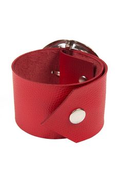 Extravagant Red Wristband - METBR4A A great everyday bracelet in a vivid red color and with a statement metal holder. This wide bracelet is very easy to wear and will be a great accent on a black outfit and will make it stand out even more. It has two snap buttons for closure as well as belt loops for the metal holder. This band is about 12 inches / 31 cm long and about 2 inches / 5 cm wide. This bracelet is made of 100% genuine leather. The item cannot be custom made. NOTE! Since every piece is Trendy Red Bracelets For Everyday, Red Adjustable Leather Bracelet, Adjustable Red Cuff Bracelet As Gift, Adjustable Red Bracelets, Trendy Red Adjustable Leather Bracelet, Modern Red Leather Bracelet, Adjustable Red Leather Strap Bracelet, Adjustable Red Bracelet With Leather Strap, A Black Outfit