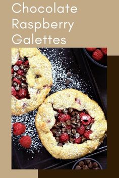 chocolate raspberry gelettes with powdered sugar on top and berries in the middle