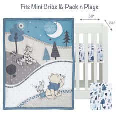 a crib bedding set with winnie the pooh in blue and white colors