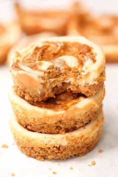 three cinnamon roll cookies stacked on top of each other with frosting in the middle