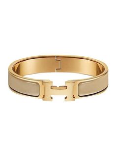 Gender: Women Brand: HERMES Product Name: Click-Ache Click H Gold Bracelet Marron Glace Bags Alora Code: 14342078 Color: beige Origin: France Designer Style ID H700001F 19 Click H Bracelet Hermes, Jewellery Stack, Bracelet Hermes, Stacked Bracelets, Hermes Bracelet, Gold Bracelets, Rose Gold Hardware, Timeless Handbag, Luxe Fashion