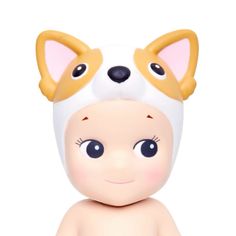 a small toy with a dog on it's head is shown in front of a white background