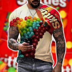 a man holding a bunch of candy in his hands