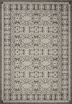 a gray and white rug with an intricate design