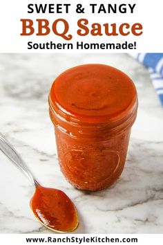 sweet and tangy bbq sauce in a jar with a spoon