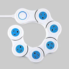 four blue and white plugs are connected to an electrical outlet in the shape of a circle